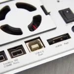 Back panel of an external hard drive with USB and power ports