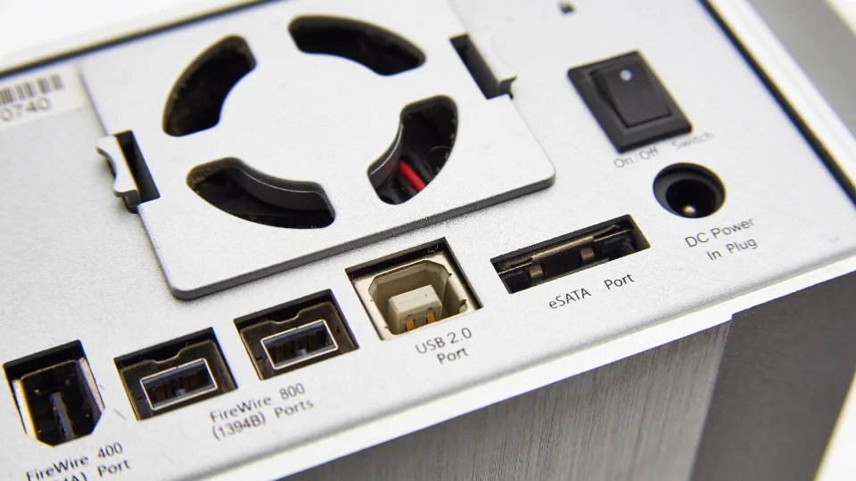 Back panel of an external hard drive with USB and power ports